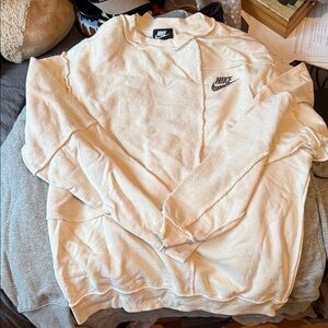 Nike women’s cream Crewneck Sweater